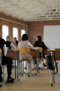 Students studying in a high school classroom. Diverse group focused on learning.